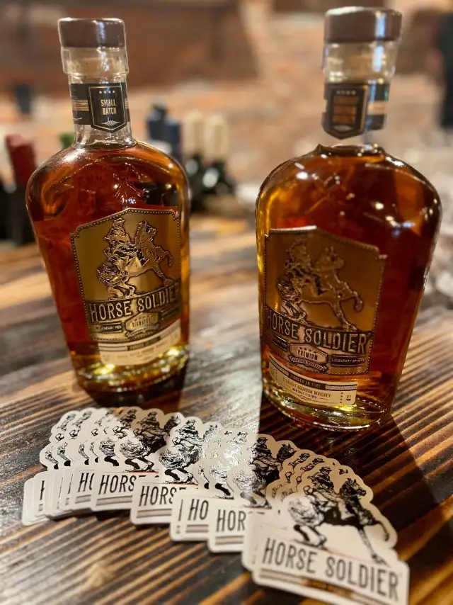 Two bottles of Horse Soldier bourbon with stickers