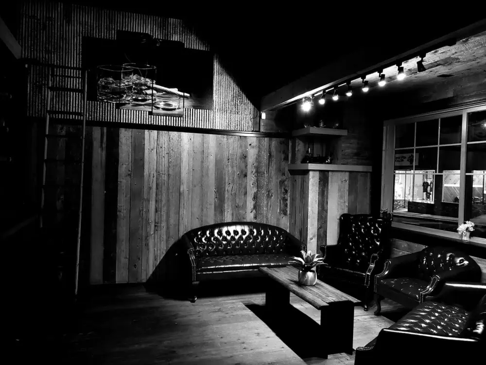Black and white view of the leather-sofa lounge