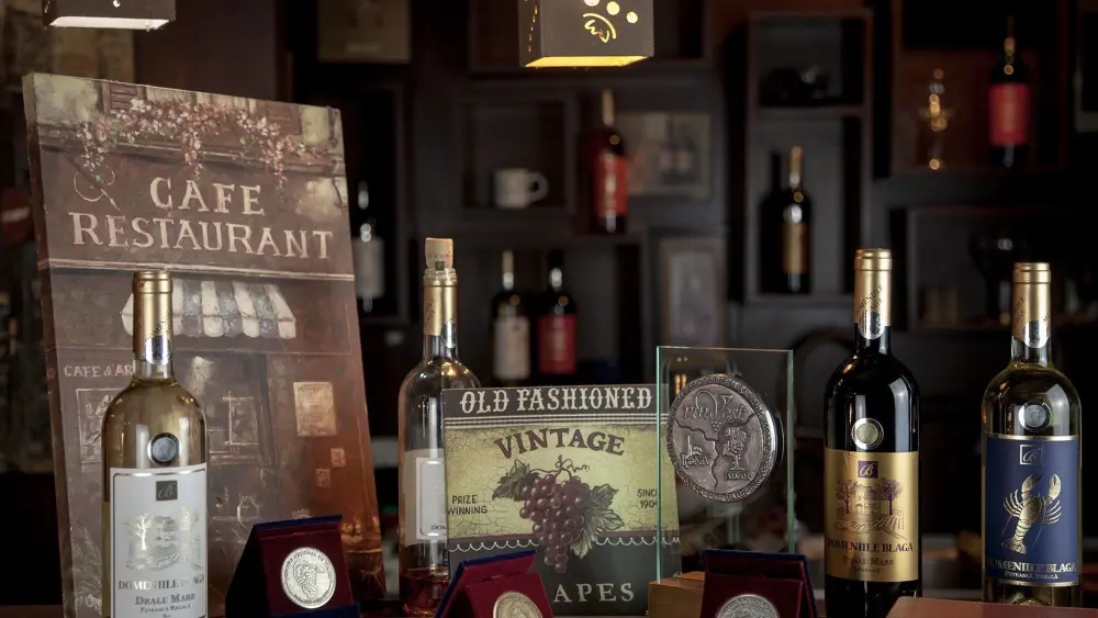 Shelves of spirits and vintage bar signs